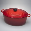 Le Creuset 8 quart oval oven. This roomy, elongated pot is perfect for making soup or stew for a crowd, cooking pasta or rice, and for boiling whole potatoes or sweet potatoes for mashing. The tight-fitting lid traps steam to seal in flavors and self-baste foods. Goes from refrigerator to the oven or stovetop to the table top and back again.