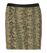 Soft silk skirt features multiple layers of glamorous python print - Flaky texture look creates dramatic style - Straight cut with narrow black waist - Short and sexy mini-length - Pair with a black blouse and ankle boots for the day and a silk tank and platform sandals in the evenings