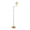 Elevate your space with the simple elegance of this Ralph Lauren floor lamp, boasting a sleek, classic style and a luminous brass shade.