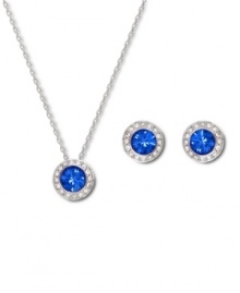 Regal and resplendent. Elevate your look with the royal blue hues of Swarovski's sapphire crystal pendant necklace and  earrings set. Made in silver tone mixed metal, it's accented by sparkling clear crystal pavé. Approximate length: 15 inches. Approximate pendant drop: 3/8 inch. Approximate earring diameter: 3/8 inch.