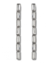 Elegant Art Deco inspiration defines these divine linear baguette crystal earrings from Swarovski. Set in silver tone mixed metal, they're an ideal look for a stylish soiree! Approximate length: 2-4/10 inches.