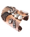 Give your look a little cuff love. Bar III's head-turning cuff bracelet features an intricate design accented by clear acrylic stones in a variety of shapes and sizes. Crafted in burnished copper tone mixed metal. Approximate diameter: 2-1/3 inches.