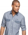 Downtown and dapper. This denim shirt from Marc Ecko Cut & Sew has some serious style appeal.