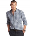 Rock your plaid in a slimmed-down fit with the classic tartan pattern of these AJ Izod shirts. (Clearance)