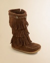 Your little trendsetter must-have these fashion-forward boots in plush suede with three layers of groovy fringe.Zip-upSuede upperRubber solePadded insoleImported