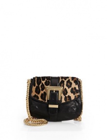 THE LOOKGoldtone shoulder chainLeopard printed calf hair flapBuckle strap front detailSnap flap closureOne inside open pocketInside logo tagTHE FITShoulder chain, 20 drop8½W X 7H X 1½DTHE MATERIALCalf hairLeatherFully linedORIGINImported