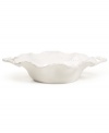 A delicate scalloped edge with distressed detail and beaded accents give the Blanc serving bowl the classic, romantic feel of Versailles Maison's charming dinnerware collection. With beautifully sculpted handles.