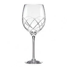 This kate spade new york Annadale iced beverage glass is rendered in sparkling European crystal cut with a swirled design.