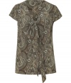 A neutral-hued paisley print lends earthy style to this silk tie-neck top from Steffen Schraut - V-neck with tie detail, short sleeves, slim fit- Pair with slim trousers, a pencil skirt, or skinny jeans