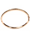 Polished and sleek. Givenchy's rose gold tone bangle bracelet features silk glass stones. Approximate diameter: 2-1/2 inches.