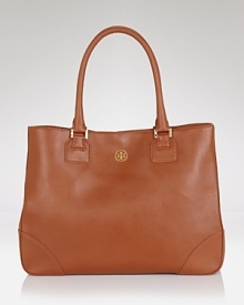 This classic tote rendered in luxurious Saffiano leather is sure to be an all-time favorite. From Tory Burch.