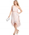 Flirty and fluttery, Jessica Simpson's plus size dress features a one-shoulder silhouette and a feminine ruffle that cascades from hip to handkerchief hem.