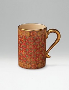 Serve coffee or tea in ceramic mugs, handpainted in a pattern inspired by Tabriz rugs. Rich, warm colors accented with 14K gold filet handle and rim.Each mug is 4 tall; 2¾ diameter Hand wash Made in Portugal