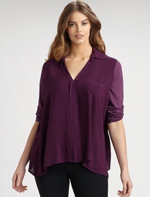 An airy top with raw-edge details that offers a relaxed, boxy fit.V-neckTab sleevesOne front pocketAbout 30 from shoulder to hemRayonHand washMade in USA