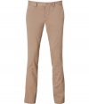 Add preppy-cool style to your workweek look with these modernized classic chinos from Woolrich - Flat front, belt loops, off-seam pockets, back welt pockets with button detail, slim fit - Pair with a modernized chambray shirt, a retro-style cardigan, and oxfords