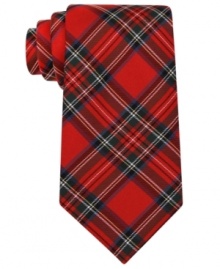 Festive and preppy all rolled into one. Accessorize his gentlemanly attire with a Tommy Hilfiger silk tie.