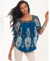 Flowing and free-spirited, INC's lightweight top makes a perfect counterpoint to fitted skirts and skinny jeans.