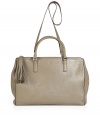 Classic, sophisticated bag made of fine taupe leather - Spacious shopper shape has plenty of room for everyday essentials and an intelligent interior layout with closable pocket - Features two carrying handles, shoulder strap and double leather tassel pendant - Favorite everyday bag is great for the office or on the weekends