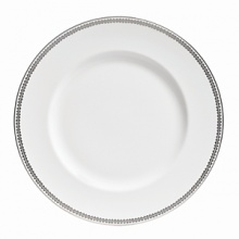 Vera Wang introduces Flirt fine bone china dinnerware. This platinum banded pattern features a modern scallop lace motif and a contemporary take on traditional lace work. Decoration on the inner verge of the accent plate, bread and butter and tea saucer adds a flirtatious touch of whimsy.