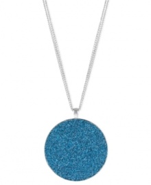 Kenneth Cole New York comes full circle. This necklace, crafted from silver-tone mixed metal, features a sparkling blue glitter pendant. Item comes packaged in a signature Kenneth Cole New York Gift Box. Approximate length: 16 inches + 3-inch extender. Approximate drop: 2-1/10 inches.