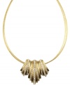 Stunning and sparkling! A chic coil silhouette defines this dazzling crystal-adorned necklace from Jones New York. Crafted in gold tone mixed metal, it'll add glamour to your evening ensemble. Approximate length: 17 inches.