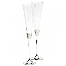 The With Love Toasting Flutes are the perfect addition when celebrating your most memorable moments. The flute pair is delicately accented by silver bands that replicate Vera Wang's most iconic jewelry collection.