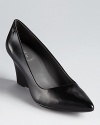 Calvin Klein's timeless style reigns on the Nadya wedges, a smart, pointed style with classic, professional appeal.