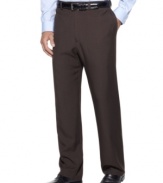 You won't believe the hand on these pants! Crafted from recycled plastic bottles and transformed into super smooth and lightweight fabric, these sophisticated flat front pants help you been kind to Mother Nature and even nicer to your workweek wardrobe. Accented with subtle heathered details and an unfinished hem, there's absolutely nothing you won't love about these Haggar dress pants.