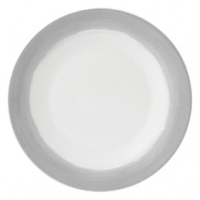 A watercolor wash of gradient gray migrates toward a warm neutral center to create an organic ombre effect on this durable, adaptable plate from Vera Wang.