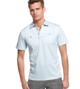 Change up your polo style with this double chest pocket shirt from Calvin Klein.