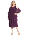 A sheer cape with beading and cutouts at the shoulders adds a sophisticated finish to SL Fashions' plus size tiered dress.