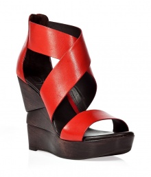 Channel easy elegance in these architectural wedges from Diane von Furstenberg - Front red leather crisscross straps, back, zip closure, edgy wooden wedge heel - Get the perfect beach-ready look with a caftan and a swimsuit or for city-ready chic with slim jeans and peasant top