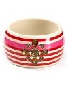 Flash your style credentials in Juicy Couture's oversized enamel bangle. With chunky stripes and shimmering gems, this bracelet is prep cool.