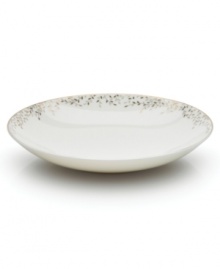 Fringed with shimmering leaves of platinum and mica, this bone china soup bowl turns your table into a springtime utopia. Its sleek coupe shape is a vision of modern elegance in platinum-banded white.