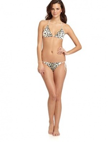 THE LOOKAllover leopard print with golden sequinsHalter straps tie at neckAdjustable padded triangle cupsBack tie closure with bead accentsTHE MATERIAL87% nylon/13% spandexFully linedCARE & ORIGINHand washImportedPlease note: Bikini bottom sold separately. 