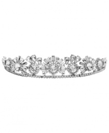 Head of the class. Add a refined, regal look to your special-occasion style with this elegant tiara from Monet. Adorned with sparkling Swarovski crystals, it's set in silver tone mixed metal. Approximate diameter: 5-1/2 inches (curved).