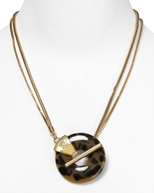 Adorn a plunging neckline with Trina Turk's ring pendant necklace. The classic tortoiseshell tone teams with everything in your closet.