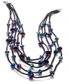 Rainbow-colored glass beads create a mesmerizing effect on this layered necklace from Style&co. Strung on a five-row fabric cord silhouette. Crafted in hematite tone mixed metal. Approximate length: 21 inches + 2-inch extender.