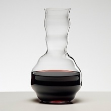 Machine-blown in Germany by Riedel, the world's most-renowned wineglass maker, this decanter fuses form and function, featuring a classic rounded base and sensual lines that graduate up the neck. The pour spout is designed for a drip-free flow, and the beautiful shape also serves to expose wine to more oxygen for a more developed bouquet and fuller flavors.