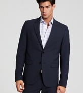 Two button, notched lapel sport coat. Front flap pockets and chest pocket. Slim fit, with a slight stretch, for a sleek body-hugging silhouette.