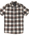 Square off for the weekend in this casual cool buffalo plaid shirt from Guess. (Clearance)