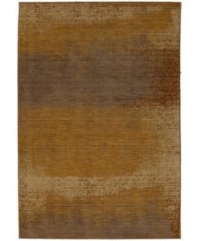 Taking its cue from French abstract artwork of the sixties, the Artois area rug from Karastan features fading colors that blend into one another for a serene, mid-century modern look. Thick and long tufting of this area rug creates an exquisitely soft addition to any contemporary living room or bedroom.