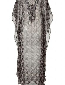 Perfect for a summer soiree, this luxe silk Melissa Odabash caftan is effortlessly chic and uncommonly sexy - V-neckline, three-quarter dolman sleeves, relaxed silhouette, all-over print, maxi length - Pair with platform wedges, a leather clutch, and a floppy hat