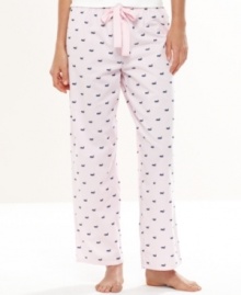 Lounge around in the easy style of Nautica's Woven Ankle pajama pants. This super soft cotton pair features an elastic waistband with a cute ribbon drawstring.