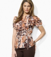 An earthy floral print enhances the soft, romantic quality of this ruffled Lauren by Ralph Lauren wrap blouse in airy, crinkled silk georgette.