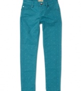 A sweet polka dot print on these skinny jeans from Roxy makes them a unique look sure to make a splash.