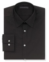 Solid dress shirt with spread collar, two button mitered cuffs. Modern fit through the body.