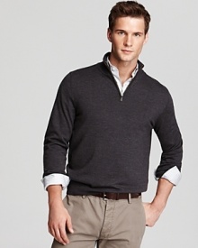 Add refinement to your wardrobe with this super-soft sweater rendered in pure merino wool and furnished with a half zip front. Layer a colorful or patterned button-down underneath to express your classic style.