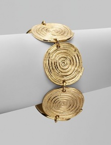 Textured discs of goldplating create a look that's at once exotic and modern.Pewter and brass Length, about 7½ Ring and toggle closure Made in USA