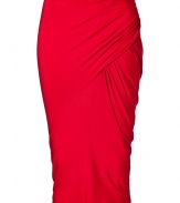 Luxe pencil skirt in fine, crimson viscose stretch - A modern classic from Donna Karan - Elegant, asymmetric drape and ruching at hips create a knockout silhouette, elongating the entire body - Curve-hugging cut hits at knee - Sexy and sophisticated, a dynamite must for parties and events - Style with a silk or sequin top and ankle booties or platform pumps